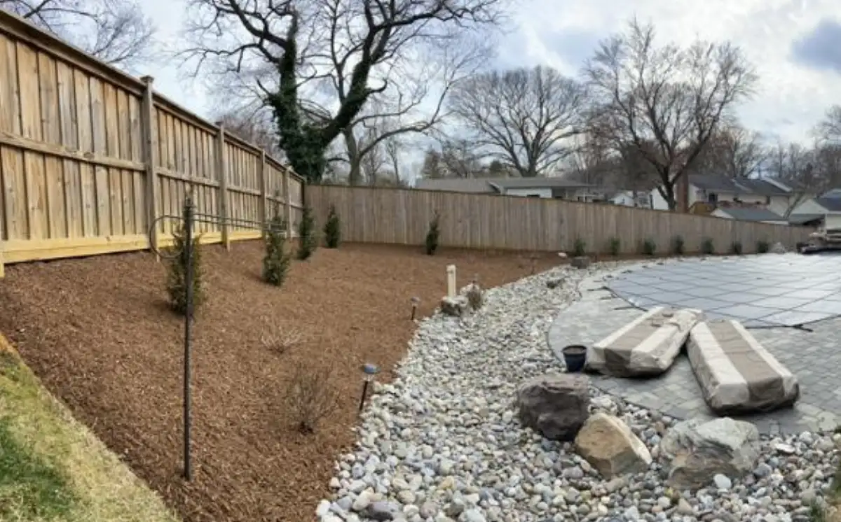 Fresh mulch installation around garden beds in Arnold MD